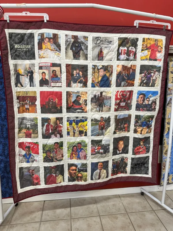 Photo memory quilt for Joshua featuring childhood through young adult milestone photos printed on fabric blocks, displayed on a quilt rack