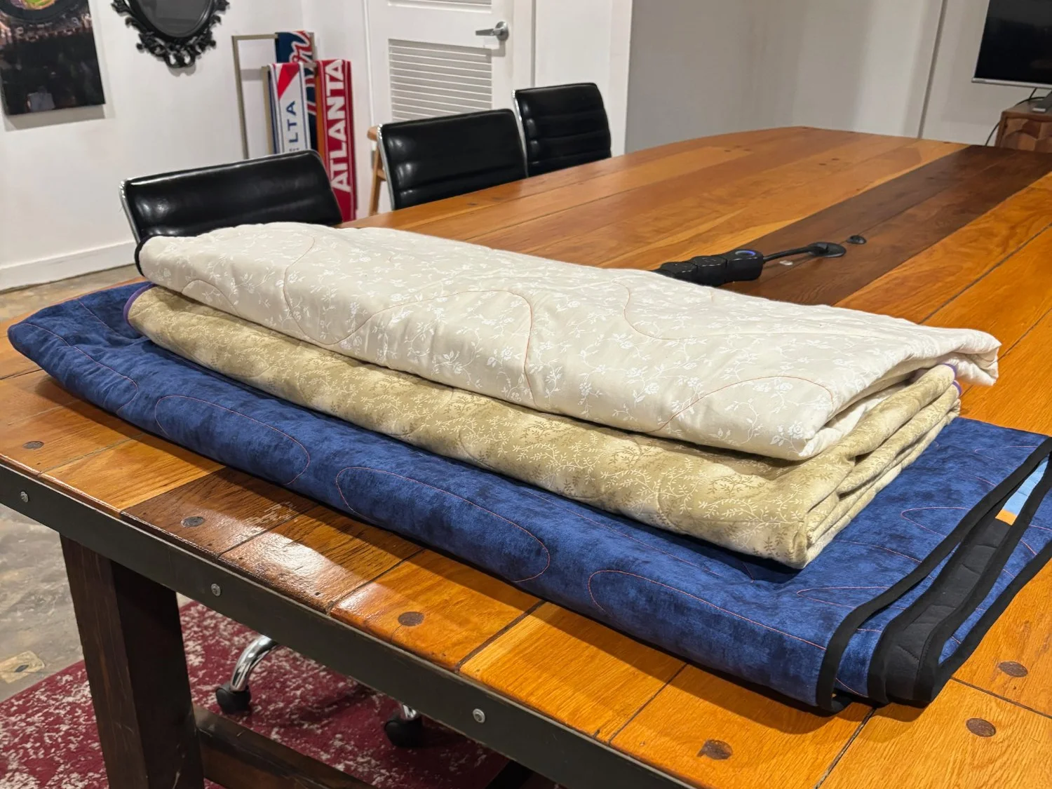 Professionally bound quilt edge showing clean mitered corners by Quilts by Big Wes in Atlanta, GA