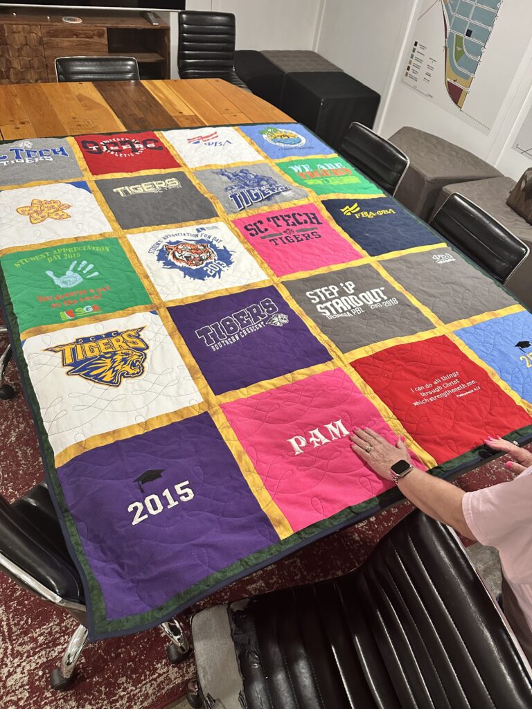 a colorful t-shirt quilt