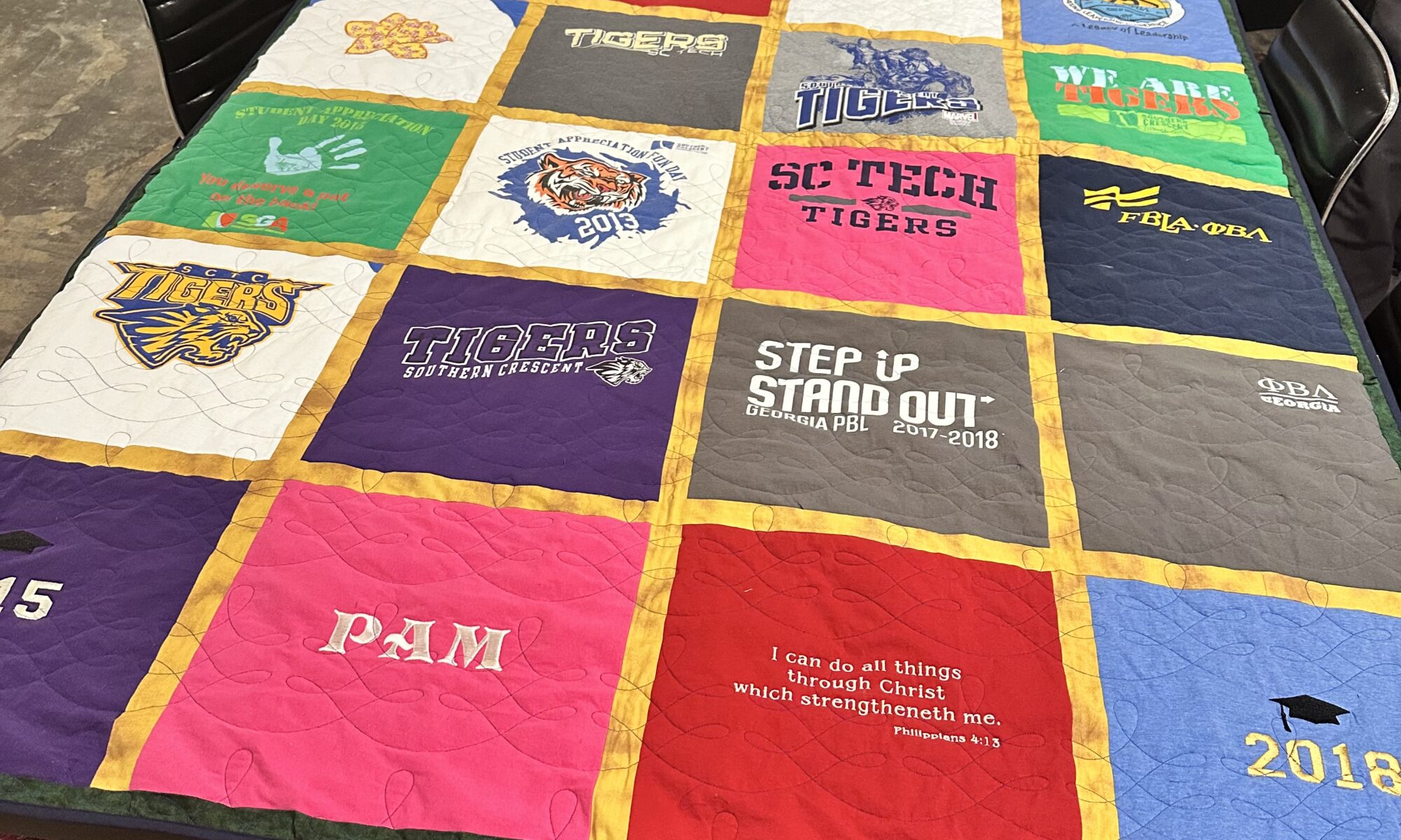 A colorful t-shirt quilt