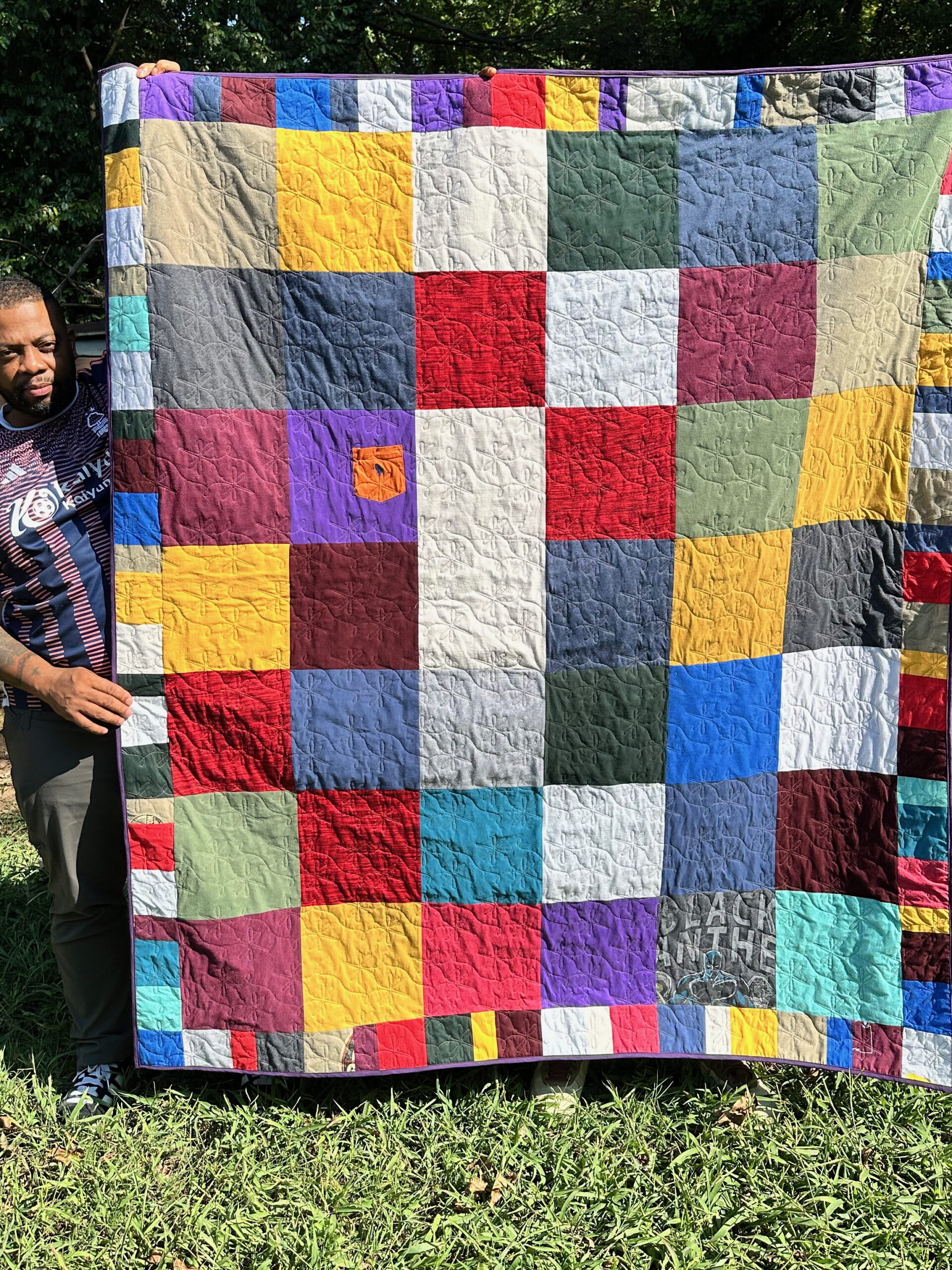 A scrappy t-shirt quilt