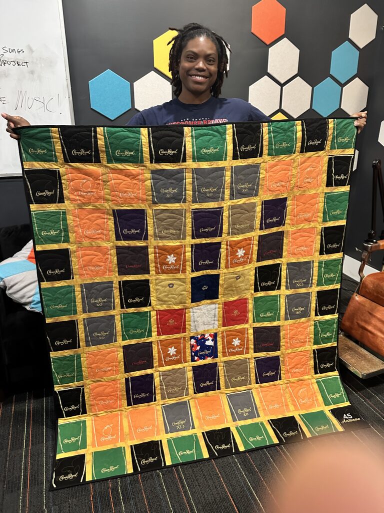 From Crown Royal bags to a one-of-a-kind quilt – turning a unique collection into a cozy, colorful masterpiece.